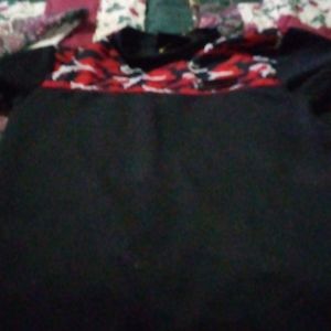 A medium supply and demand short sleeve shirt